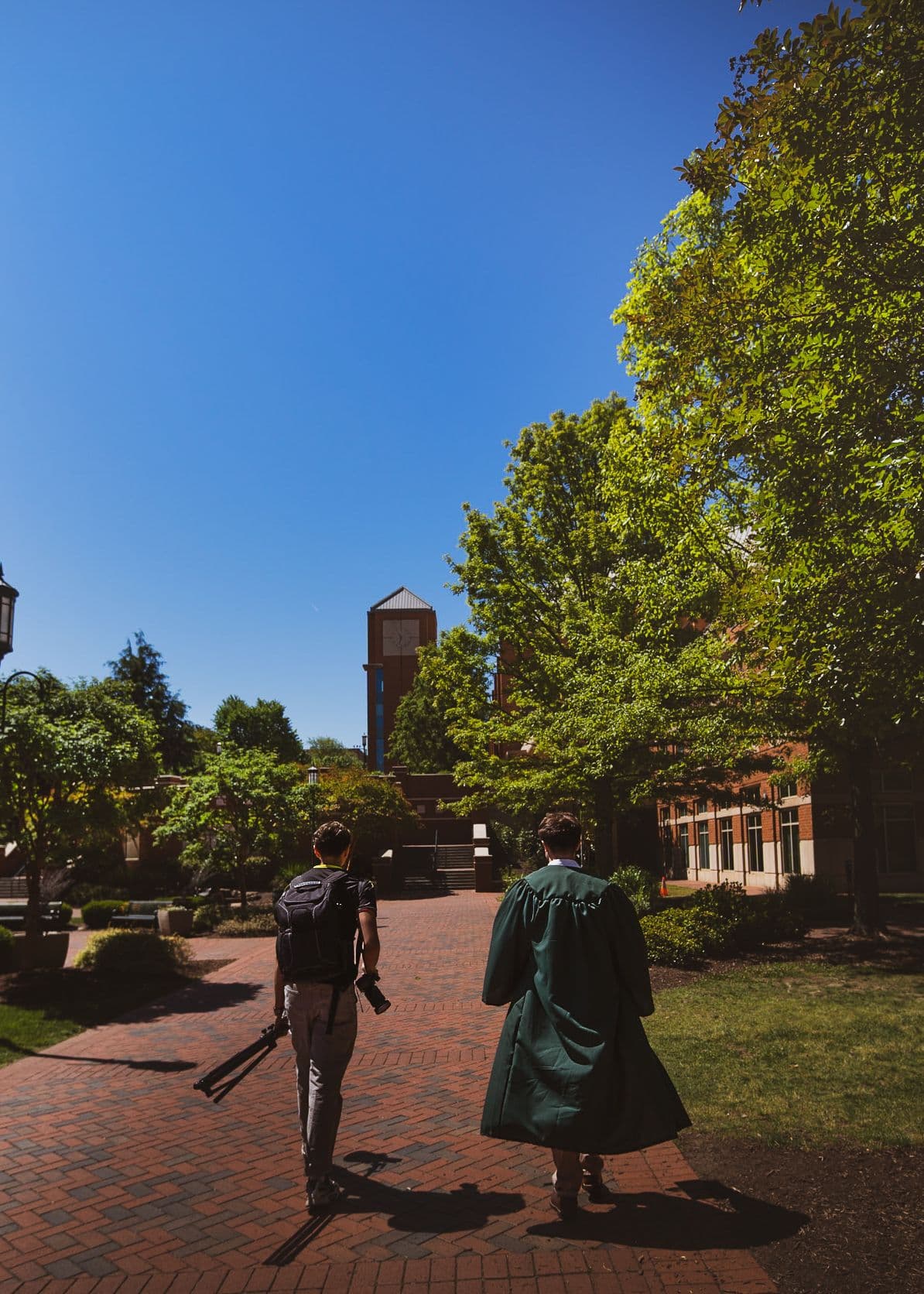 Behind the scenes: walking across campus with a graduate before the shoot